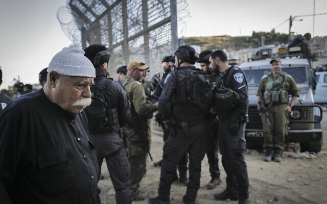 Soldiers guard the  Israeli-Syrian border as Druze residents on both sides of the frontier protest on July 16, 2025. (Michael Giladi/Flash90)