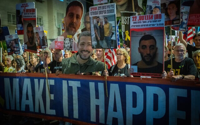 Families of hostages, former captives and their supporters march to the US embassy branch in Tel Aviv, during a rally calling for the release of all hostages, July 19, 2025. (Erik Marmor/Flash90)