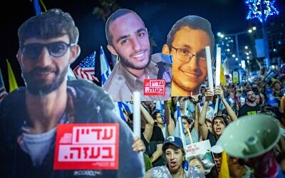 Hostage families and their supporters march to the US Embassy Branch Office in Tel Aviv, demanding the release of the captives, July 19, 2025. (Erik Marmor/Flash90)