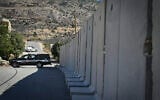 Israeli security forces stand guard at the Israeli border fence with Syria, near the Druze town of Majdal Shams in the Golan Heights, July 19, 2025. (Michael Giladi/Flash90)