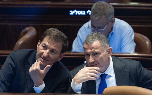 Likud MK Boaz Bismuth (left) speaks to fellow party MK Yuli Edelstein in the Knesset on July 23, 2025. (Yonatan Sindel/Flash90) Likud MK Boaz Bismuth (left) speaks to fellow party MK Yuli Edelstein in the Knesset on July 23, 2025. (Yonatan Sindel/Flash90)