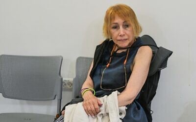 Tamar Gershuni, an anti-government activist in her 70s, arrested for allegedly plotting to assassinate Prime Minister Benjamin Netanyahu, arrives for a court hearing in Tel Aviv, July 24, 2025. (Avshalom Sassoni/Flash90)