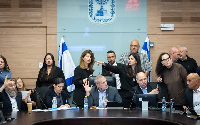 MK Hanoch Milwidsky, center, chairs a meeting of the Knesset Finance Committee, July 29, 2025. (Chaim Goldberg/Flash90)