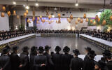 Haredi rabbis attend a conference against efforts to draft ultra-Orthodox youths into the IDF in Kibbutz Ma'ale Hahamisha, on July 30, 2025. (Chaim Goldberg/FLASH90)