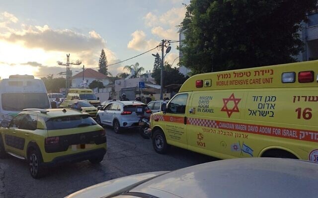 A Magen David Adom ambulance stands at the scene where a 2-year-old girl was found in a closed car, unattended, unconscious and in critical condition with signs of heat stroke, in Hadera, July 3, 2025. (Magen David Adom)