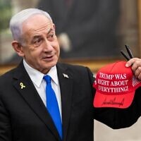 Prime Minister Benjamin Netanyahu holds a cap with the message 'Trump was right about everything!' in a photo posted by the White House on July 8, 2025, after Netanyahu's meeting with US President Donald Trump. (via X)