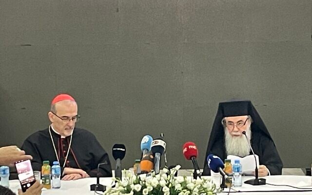 Patriarch Theophilos III of Jerusalem (right) and Latin Patriarch of Jerusalem Pierbattista Pizzaballa (left) hold a press conference in the town hall of the West Bank town of Taybeh, July 14, 2025. (Jeremy Sharon/Times of Israel) Patriarch Theophilos III of Jerusalem (right) and Latin Patriarch of Jerusalem Pierbattista Pizzaballa (left) hold a press conference in the town hall of the West Bank town of Taybeh, July 14, 2025. (Jeremy Sharon/Times of Israel)