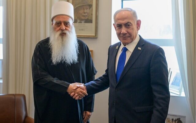 Prime Minister Benjamin Netanyahu, right, meets in his office with Sheikh Muwaffaq Tarif on July 24, 2025. (Maayan Toaf/GPO)