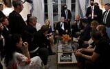 Prime Minister Benjamin Netanyahu and his wife Sara, center, meet with families of hostages held in Gaza, in Washington, DC, July 9, 2025. (Avi Ohayon/GPO)