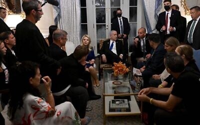 Prime Minister Benjamin Netanyahu and his wife Sara, center, meet with families of hostages held in Gaza, in Washington, DC, July 9, 2025. (Avi Ohayon/GPO)
