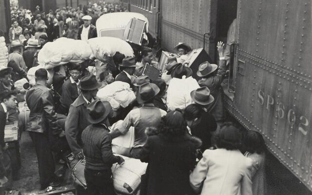 Leaving Los Angeles for Manzanar on the same transport as Elaine and Tommy Yoneda, April 1, 1942. (Courtesy of the National Archives and Records Administration)