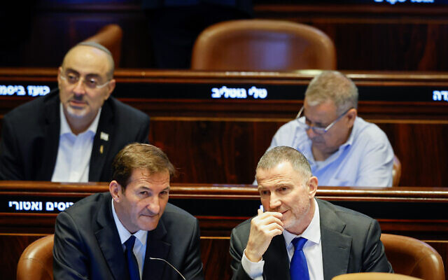 Likud MKs Boaz Bismuth (left) and Yuli Edelstein in the Knesset plenum, July 23, 2025. (Noam Moskowitz, Office of the Knesset Spokesperson) Likud MKs Boaz Bismuth (left) and Yuli Edelstein in the Knesset plenum, July 23, 2025. (Noam Moskowitz, Office of the Knesset Spokesperson)