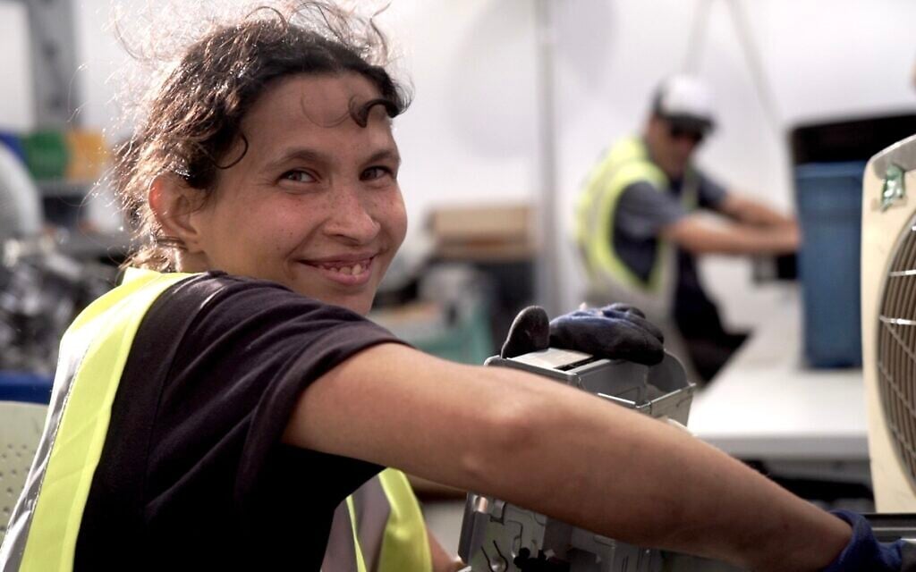 Ulfaat, who works in the dismantling department of Ecology for a Protected Community. (Eitan Dotan)