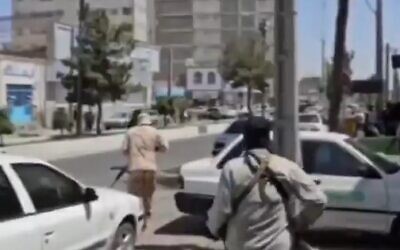 Iranian security forces run toward the scene of an attack on a courthouse by separatists in the city of Zahedan on July 26, 2025 (screencapture/X)