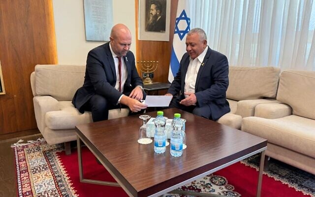 National Unity MK Gadi Eisenkot (right) presents his letter of resignation to Knesset Speaker Amir Ohana on July 2, 2025. (Courtesy) National Unity MK Gadi Eisenkot (right) presents his letter of resignation to Knesset Speaker Amir Ohana on July 2, 2025. (Courtesy)