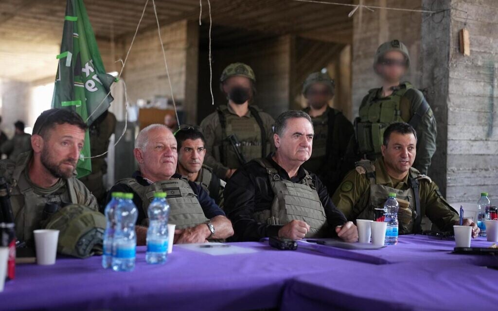 Defense Minister Israel Katz and Tourism Minister Haim Katz, along with senior IDF officials, visit troops in Rafah, southern Gaza, July 2, 2025. (Ariel Hermoni/Defense Ministry)