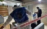 Police at the scene where a 3-year-old girl was stabbed to death and her father arrested as the main suspect, in Sur Baher, July 7, 2025 (Israel Police)