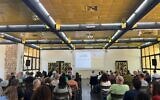 Aviad Friedman, head of the Tekuma Directorate, explains a funding plan to enable Gaza border communities to attract new residents by increasing their housing portfolios. The meeting was held at Kibbutz Alumim, southern Israel, July 10, 2025. (Tekuma Directorate)