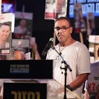 Released hostage Eli Sharabi speaks at a weekly rally at Hostages Square, Tel Aviv, July 12, 2025. (Alon Gilboa/Hostages and Missing Families Forum)