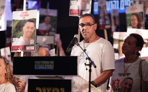 Released hostage Eli Sharabi speaks at a weekly rally at Hostages Square, Tel Aviv, July 12, 2025. (Alon Gilboa/Hostages and Missing Families Forum)