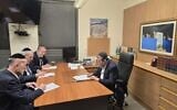 Members of the United Torah Judaism party's Degel Hatorah faction write letters of resignation in Knesset Finance Committee chairman Moshe Gafni's office. (Courtesy)