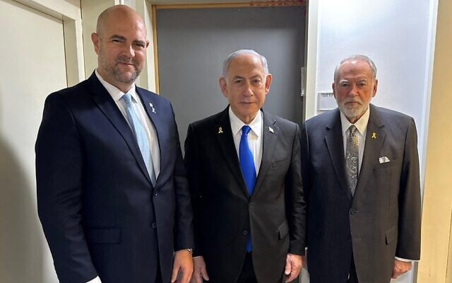 Knesset Speaker Amir Ohana (L), Prime Minister Benjamin Netanyahu (C) and US Ambassador Mike Huckabee (R) at the Tel Aviv District Court during the premier's criminal trial on July 16, 2025 (Courtesy via Ohana's spokesman)