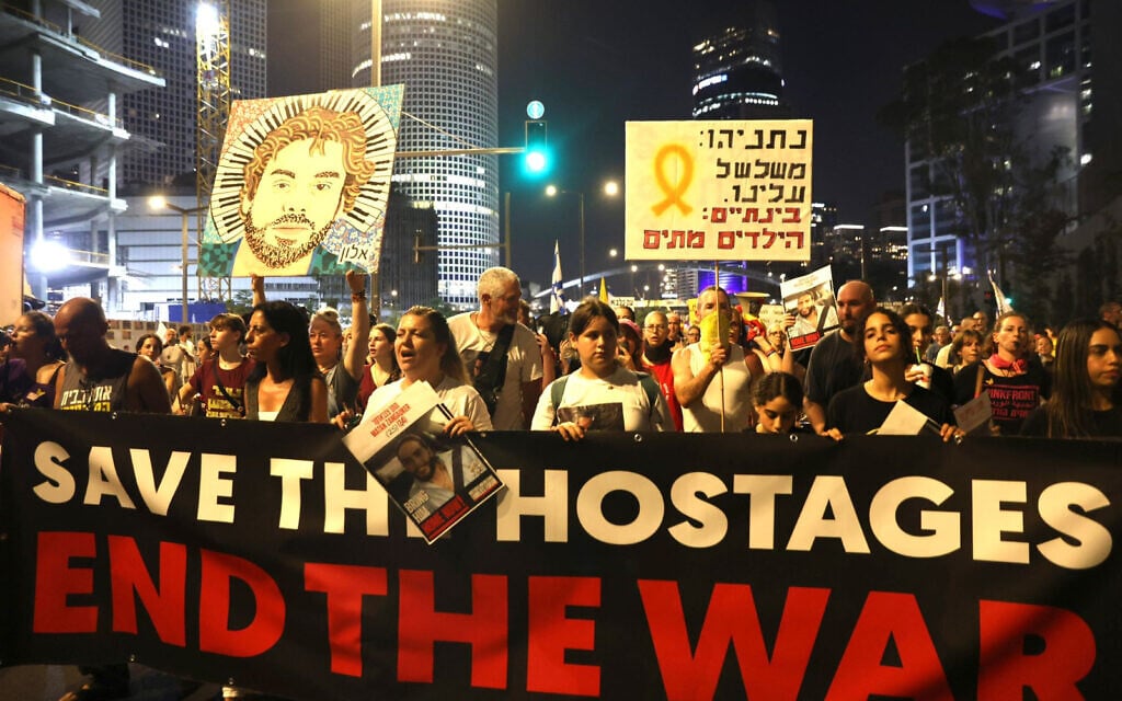 Protesters march from Begin Street to the US Embassy Branch in Tel Aviv during a demonstration in favor of a hostage release and ceasefire deal, on July 26, 2025. (Gil Beeri/Pro-Democracy Protest Movement)