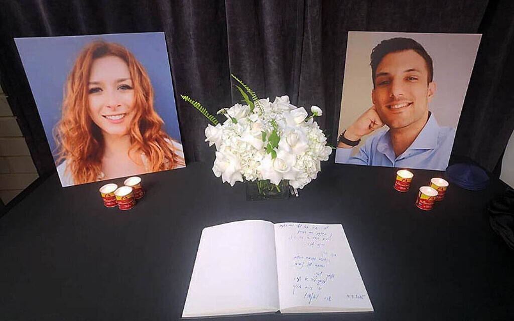 A memorial plaque for Sarah Milgrim and Yaron Lischinsky, two employees of the Israeli Embassy in the US who were killed in a terror attack, at an event attended by Prime Minister Benjamin Netanyahu and his wife Sara, July 10, 2025. (Prime Minister’s Office)