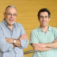 Prof. Michael Fainzilber, left, and Dr. Eitan Erez Zahavi of Weizmann Institute of Science. (Courtesy/Weizmann Institute of Science)