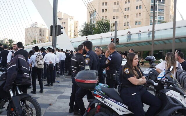 Police during a Haredi anti-conscription protest in Jerusalem on July 23, 2025. (Charlie Summers/Times of Israel)