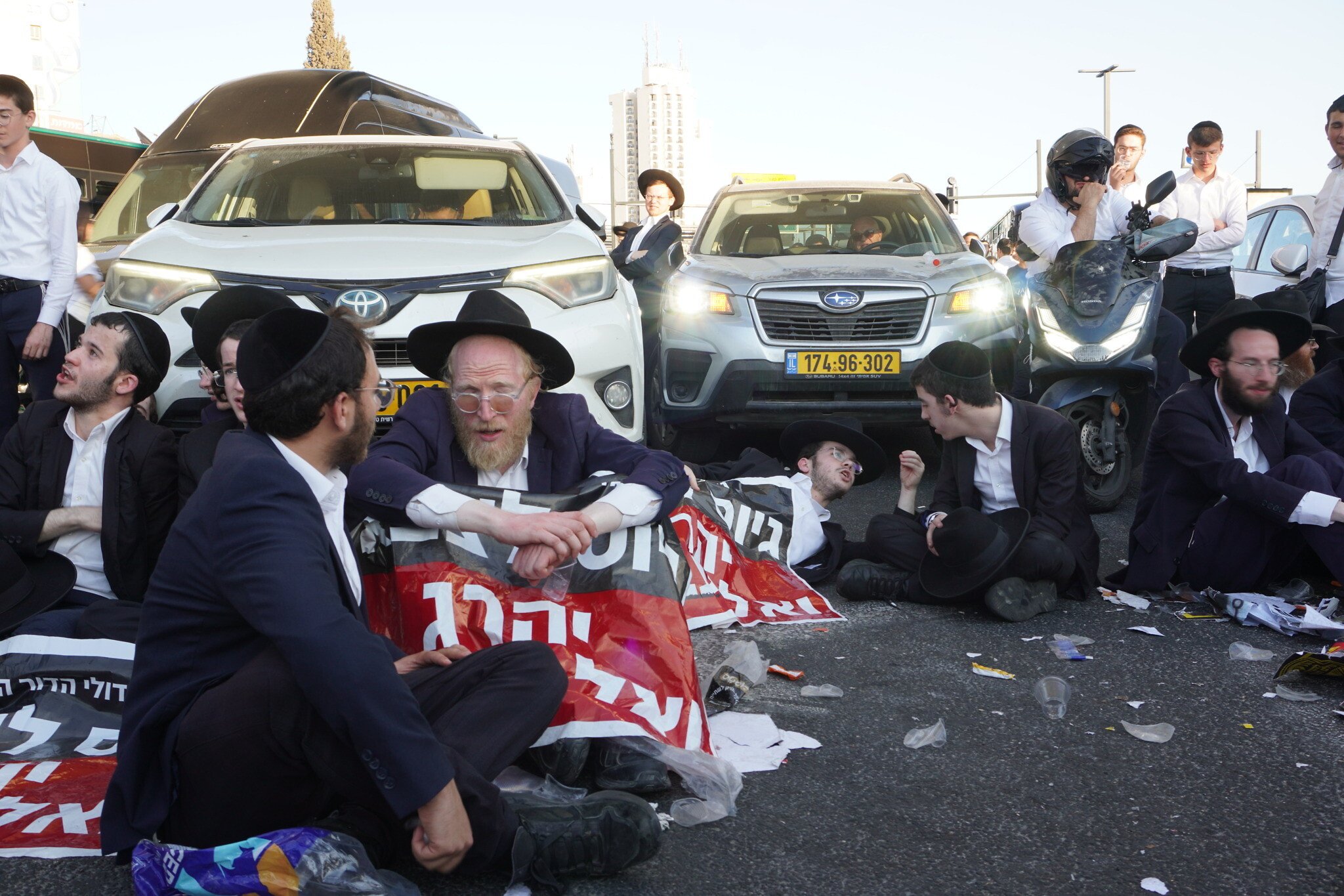 Haredi protesters block entrance to Jerusalem, roads elsewhere to protest arrest of draft-dodgers