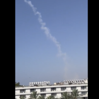 Smoke is seen over Eilat after a drone launched from Yemen is shot down by the IDF, July 15, 2025. (Screenshot used in accordance with clause 27a of the copyright law)