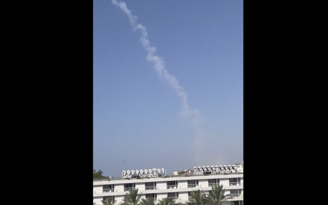 Smoke is seen over Eilat after a drone launched from Yemen is shot down by the IDF, July 15, 2025. (Screenshot used in accordance with clause 27a of the copyright law)