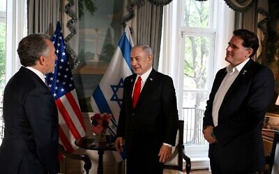 Prime Minister Benjamin Netanyahu (C) and Strategic Affairs Minister Ron Dermer (R) speak with US envoy to the Mideast Steve Witkoff (L), during the premier's visit to Washington, DC on July 7, 2025. (Avi Ohayon/GPO)