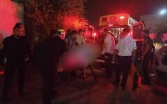 Paramedics arrive to the scene of a shooting which left one woman dead and another critically injured in Lod on July 12, 2025. (Magen David Adom)