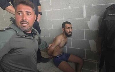 Israeli security forces arrest terror suspect Arkan Khaled in Kfar Yona, July 26, 2025. (Israel Police)