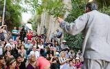 A guided tour at last year's Manofim contemporary art festival in Jerusalem; this year's event begins on July 22, 2025. (Courtesy)