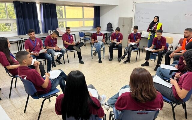 Participants in the vocational program "Matzpen-Tech" run by AJEEC partake in one of the program lectures. (Courtesy/AJEEC)