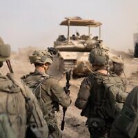 IDF troops operate in the Zeitoun neighborhood of Gaza City, in a handout photo issued on August 15, 2025. (Israel Defense Forces)