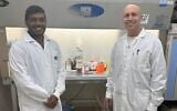 Prof. Ariel Munitz, right, stands with PhD student Anish Dsilva in their lab at Tel Aviv University's Gray Faculty of Medical and Health Sciences. (Courtesy/Tel Aviv University)