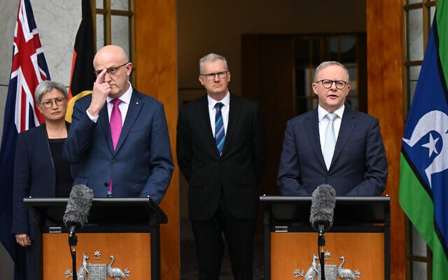 Australian Prime Minister Anthony Albanese and Director-General of ASIO Mike Burgess speak to the media during a press conference at Parliament House in Canberra, August 26, 2025. (AAP Image/Lukas Coch)