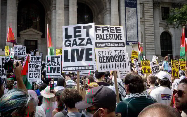 Anti-Israel protesters accuse Israel of genocide in New York City, August 16, 2025. (Luke Tress/Times of Israel)