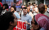 Mahmoud Khalil, center, at an anti-Israel protest in New York City, August 16, 2025. (Luke Tress/Times of Israel)