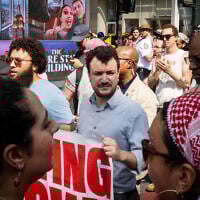 Mahmoud Khalil, center, at an anti-Israel protest in New York City, August 16, 2025. (Luke Tress/Times of Israel)