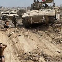 Hamas operatives surrender to IDF troops of the Givati Brigade in northern Gaza's Beit Hanoun, August 2, 2025. (Israel Defense Forces)