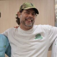 Simon Fischler, center, with Dr. Ben Ben Avraham, left, and Prof. Leor Perl, right, after Fischler's groundbreaking emergency heart surgery at Rabin Medical Center. (Courtesy/Rabin Medical Center)