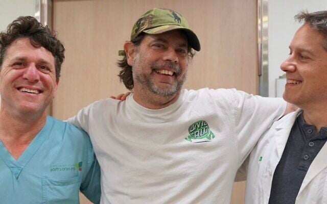 Simon Fischler, center, with Dr. Ben Ben Avraham, left, and Prof. Leor Perl, right, after Fischler's groundbreaking emergency heart surgery at Rabin Medical Center. (Courtesy/Rabin Medical Center)