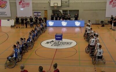 Members of the British men's wheelchair basketball squad turn their backs while Israel's national anthem "Hatikva" plays before a Basketball Nations Cup game in Cologne, Germany, on August 16, 2025. (YouTube screenshot)