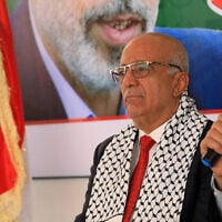 Yemen's Houthi Prime Minister Ahmed al-Rahawi visits the offices of Hamas in Sanaa, to offer his condolences over the killing of the terror group's leader Yahya Sinwar, on October 20, 2024. (Mohammed Huwais/AFP)