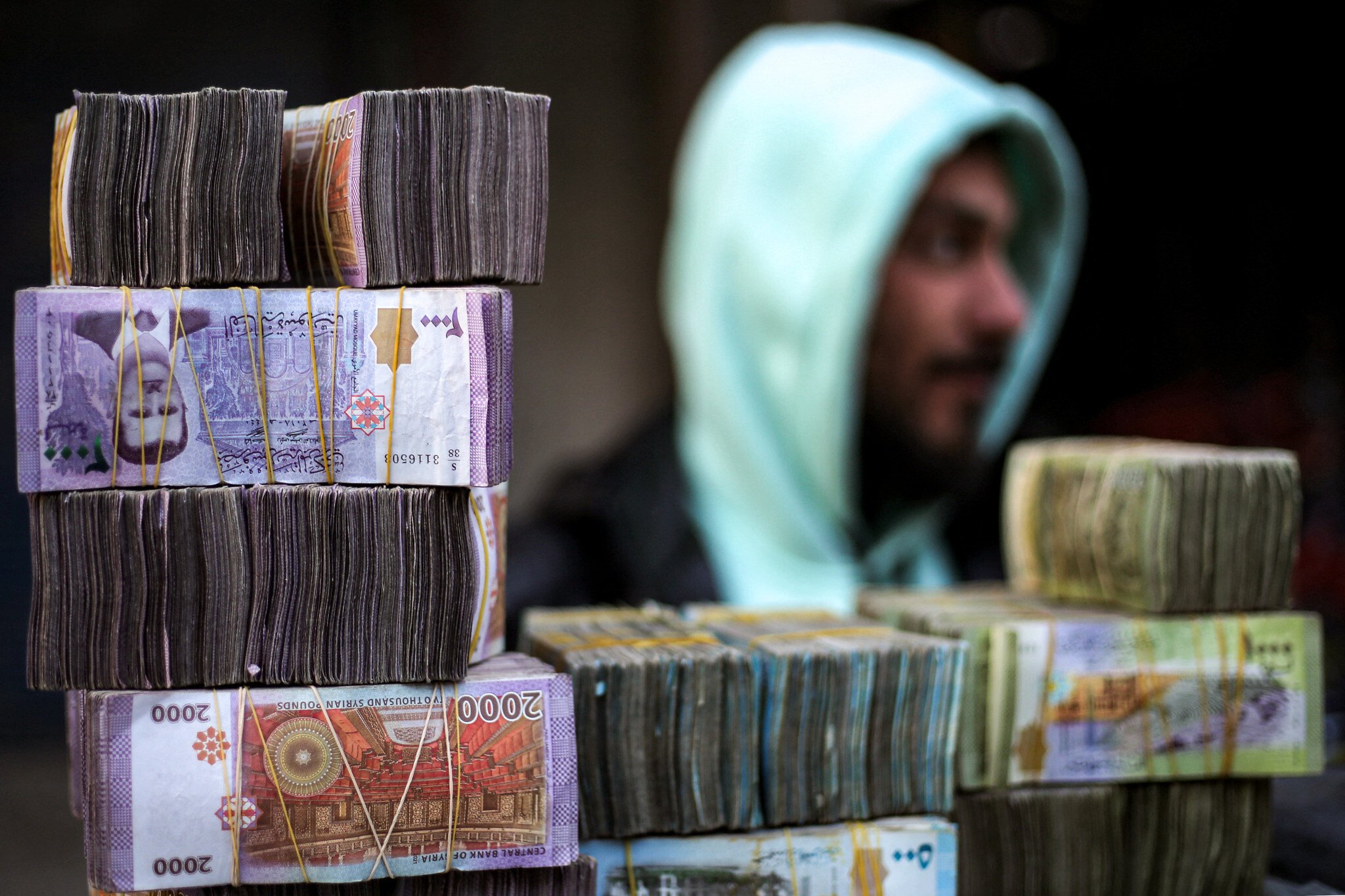 NextImg:Syria to revalue currency, dropping two zeros in bid for stability
